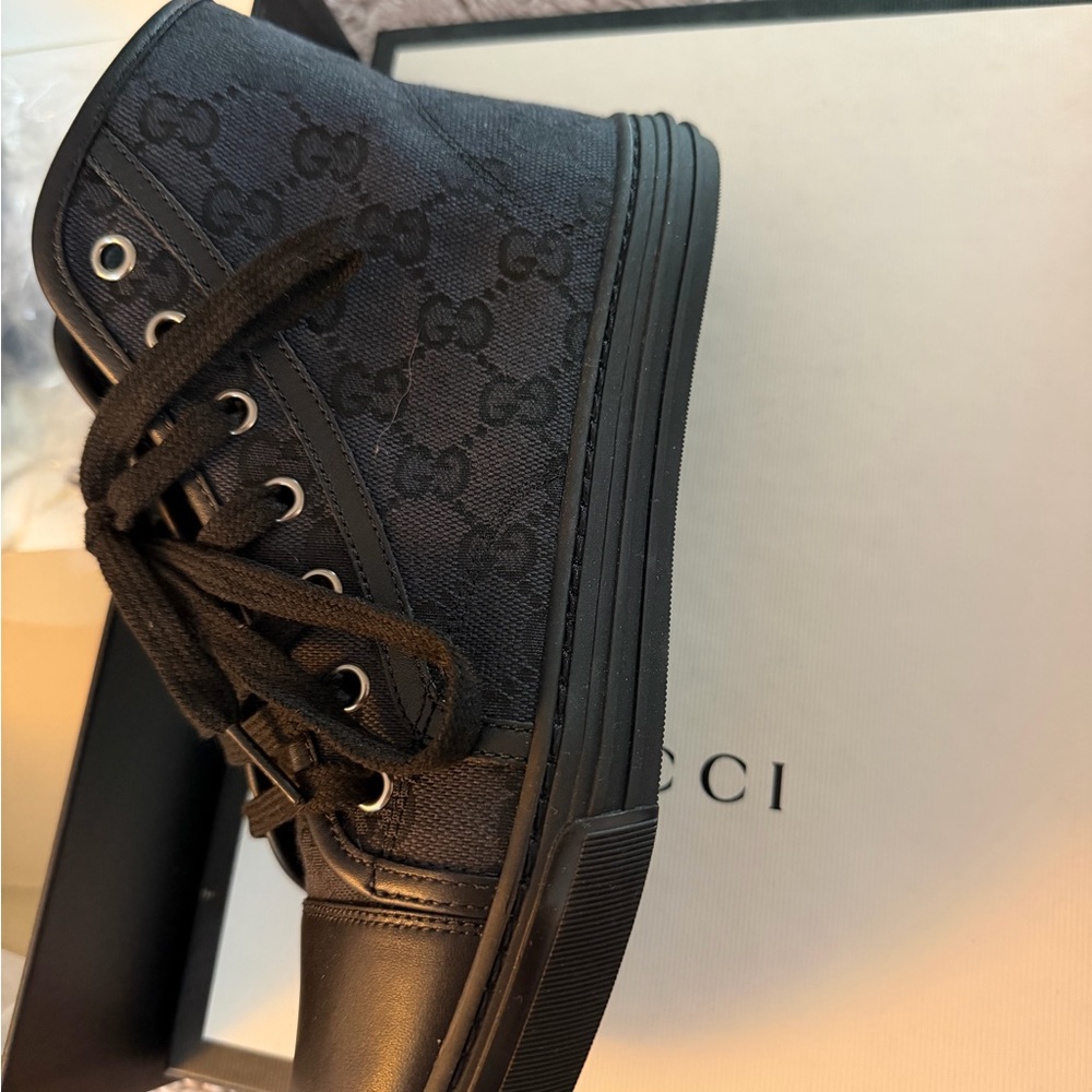 Gucci Black High-Top Sneakers Put on once but never worn outside the house.